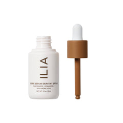 ILIA tint swatch on cheek demonstrates buildable coverage and a luminous finish.