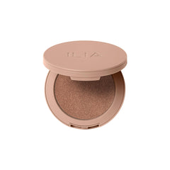 Ilia SunShift Eclipse swatch shows peachy bronze warmth with blendable cream-to-powder texture