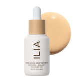 ILIA Super Serum Skin Tint bottle close-up showing Formosa ST4 with lightweight hydration.