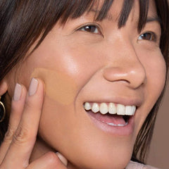 Buildable coverage swatch of ILIA True Skin Serum Foundation on forearm