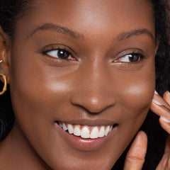 Close-up of natural finish on skin with ILIA True Skin Serum Foundation.