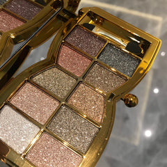 Impeccablery glitter eyeshadow palette, open case showing vibrant gold shades for daily looks.