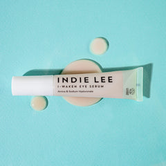 Indie Lee I-Waken applicator demonstrates cooling, soothing under-eye application