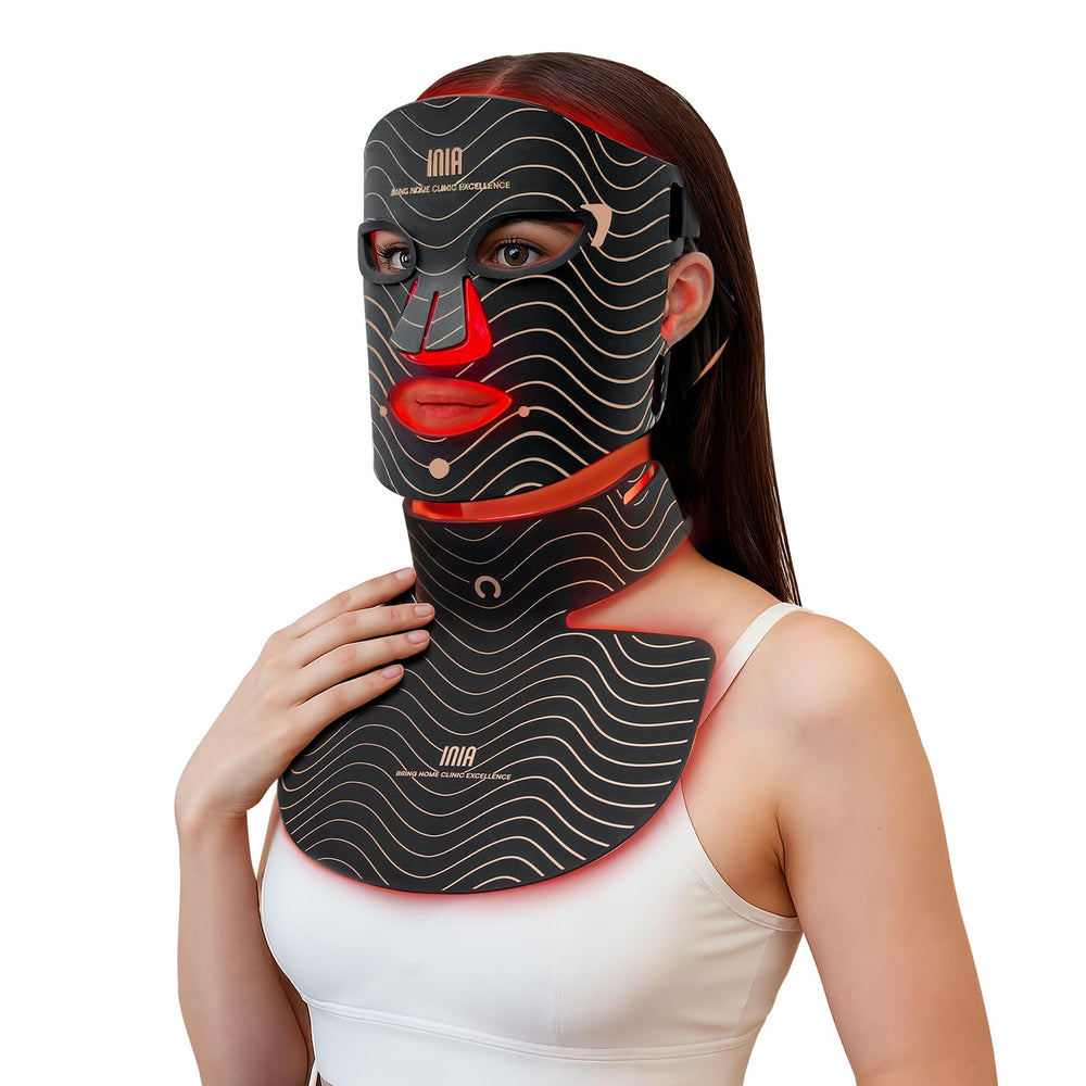 INIA red light therapy mask on the face for an even, radiant look.