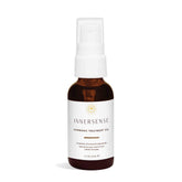 INNERSENSE Natural Harmonic Treatment Oil bottle closeup for hydrated scalp and hair.