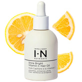 Intelligent Nutrients Shine Bright bottle pour for easy application and luminous hair.