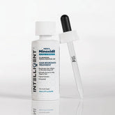 Intelligent Shop Minoxidil bottle with dropper for precise scalp dosing and quick-dry finish.