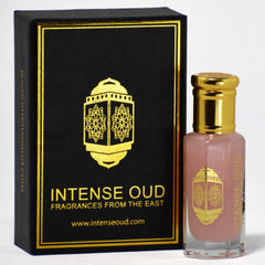 INTENSE OUD Pink Musk bottle close-up highlighting premium perfume oil with lasting scent.