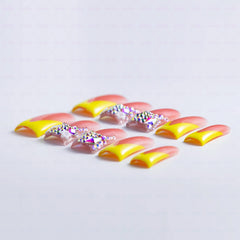 IntoVibes nails with bling rhinestones for festive sparkle and events.
