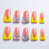 IntoVibes duck-shape nails in yellow gloss for bold party looks.