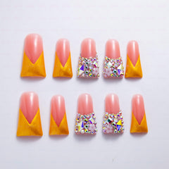 IntoVibes yellow shimmer bling nails showcase radiant color for party-ready looks.