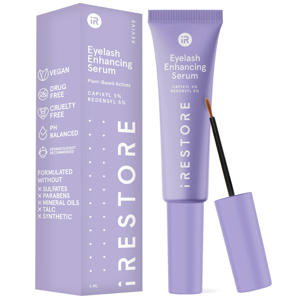 iRESTORE Eyelash Serum bottle front; vegan formula supports lash enhancement.