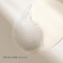 Isdinceutics Essential Cleansing Oil texture-emulsion shows oil-to-milk transformation.