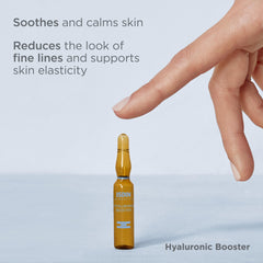 Isdinceutics ampoules packaging on display in a premium skincare setting