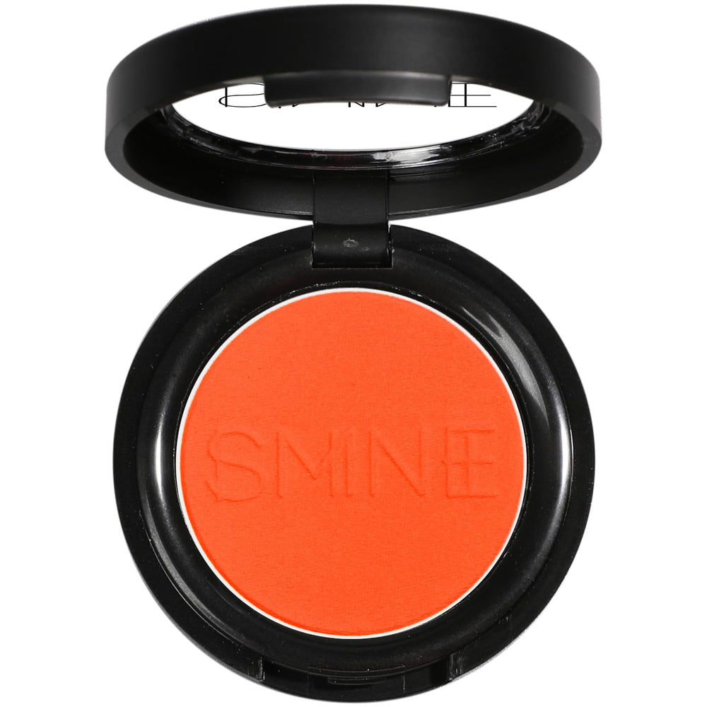 IS'MINE orange matte eyeshadow palette open, showing bold pigment for vibrant looks.