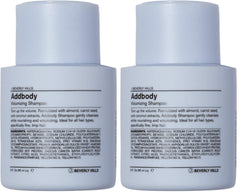 J Beverly Hills Blue Addbody shampoo bottle for volumizing cleanse and salon-quality care.