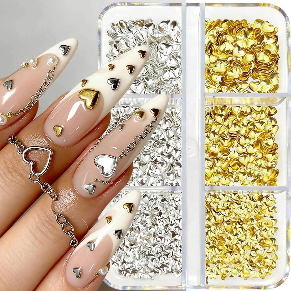 Jaliya gold 2mm small heart stud adds delicate charm to nails.