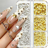 Jaliya gold 2mm small heart stud adds delicate charm to nails.