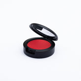 Jerome Alexander Blush 'n' Kiss Jam swatch shows vibrant cheek color