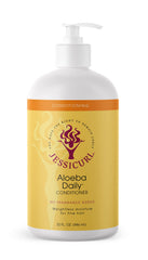Jessicurl Aloeba conditioner being massaged into damp curls for detangling.