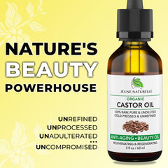 Jeune Naturelle Castor Oil bottle closeup showing golden unrefined texture.