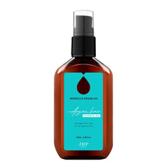 JHP Moroccan Argan Serum bottle pour for quick absorption on frizzy hair