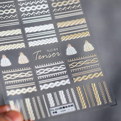 JIALITFUN weave sweater embossed stickers add textured, cozy nail art.