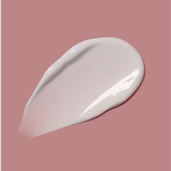 Texture closeup of JIGME CALA R.A.R.E Beauty Selena G hand cream.