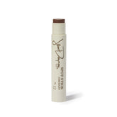 Jillian Dempsey Spot Stick Concealer on a blemish providing quick coverage