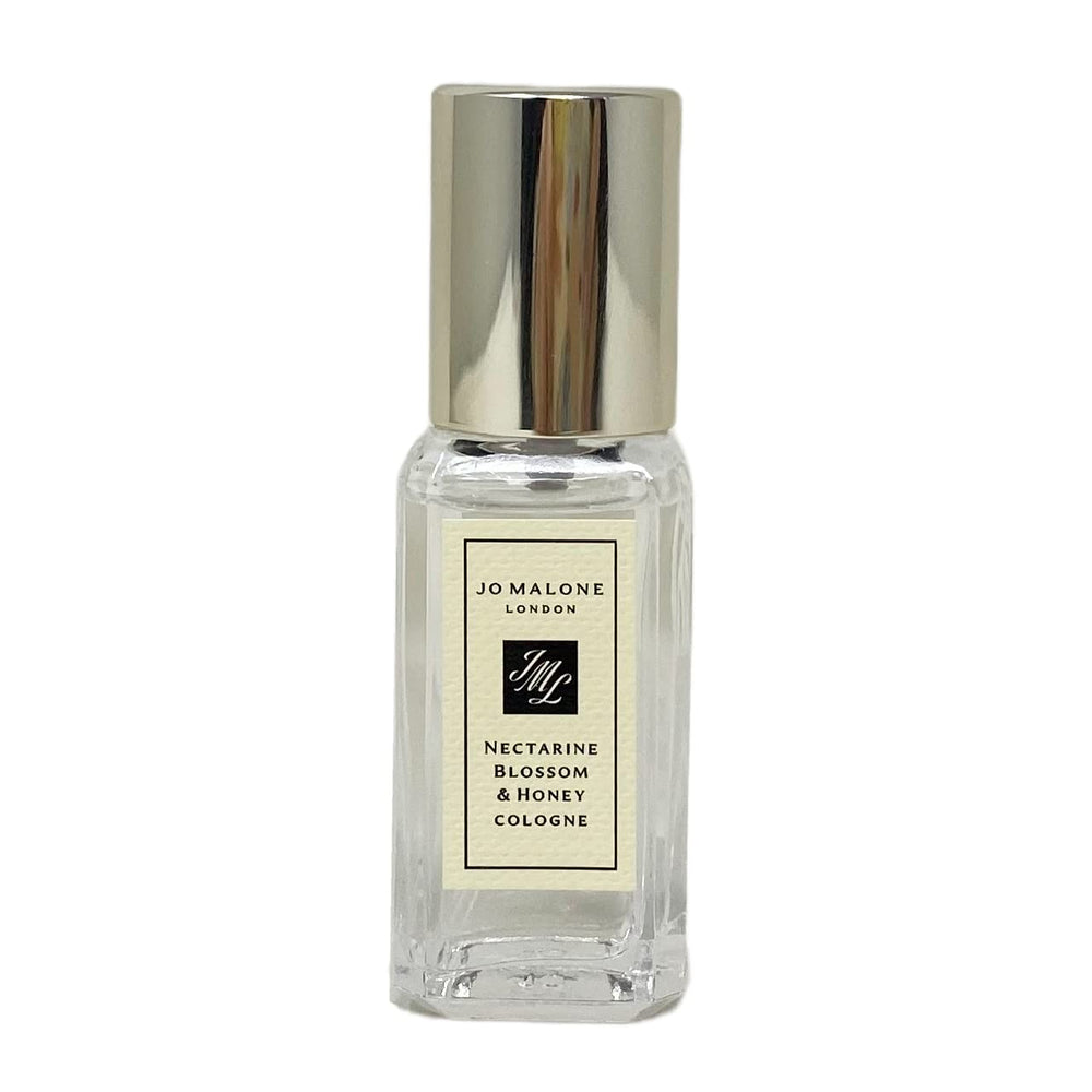 Jo Malone Nectarine Blossom & Honey travel-size Cologne bottle for on-the-go fragrance and layering.