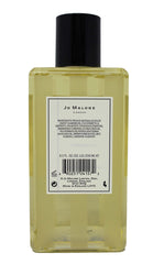 Jo Malone Pomegranate Noir Bath Oil texture showcases a softly foaming bath experience.