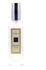 Jo Malone Wood Sage & Sea Salt spray nozzle in focus, easy to apply for a coastal vibe.