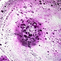 Joanne Arden Organics mesh bag with leather petals for premium gift presentation