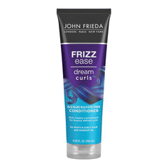 John Frieda Dream Curls Conditioner bottle for frizz control and curl definition.