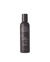 John Masters Organics Repair Conditioner bottle highlights silicone-free nourishment for damaged hair.