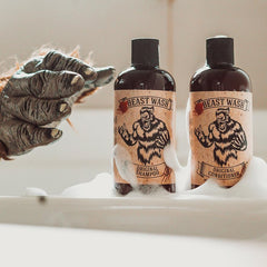 Johnny Slicks Conditioner application scene shows hands applying for soft, manageable hair.