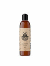 Johnny Slicks beard wash bottle with tea tree and peppermint for refreshing cleansing.
