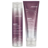 Joico Defy Damage shampoo bottle showing color protection and bond strengthening benefits.