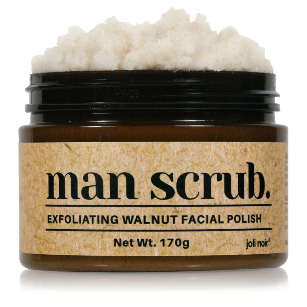 Joli Noir Walnut Face Scrub bottle close-up highlighting deep cleansing.