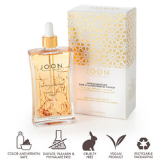 Joon Saffron Hair Elixir oil dispense shows controlled application before styling.