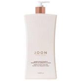 Joon Saffron Rose Shampoo bottle on display, inviting daily cleansing for vibrant hair.