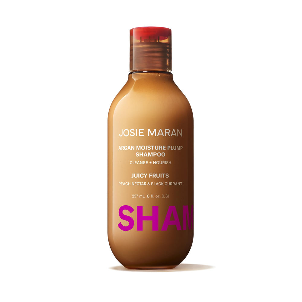 Josie Maran Argan Moisture Plump Shampoo bottle-front view highlights hydration and shine.