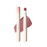 JUDYDOLL Dusty Fig cushion lip cream swatch showing rich color and smooth matte finish.