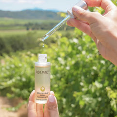 Juice Beauty JB SC Vinifera Replenishing Oil packaging as premium skincare essential.