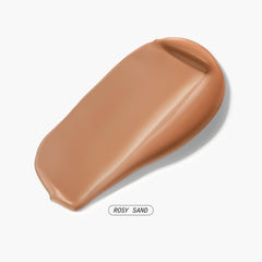 Close-up swirl showing Phyto Pigments blending for buildable coverage in Rosy Sand shade.