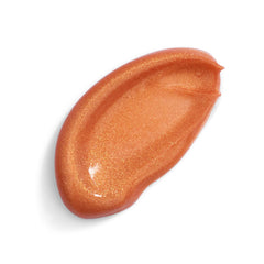 Juicy Skin Care Body Lotion provides subtle shimmer on shoulders and décolleté