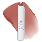 Julep It's Balm Tint of Color 90's Neutral swatch on lips for hydrating shine.