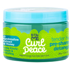 Just For Me Curl Peace Detangling Treatment shown on hair during detangling for smoother results.
