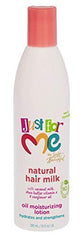Just For Me Natural Hair Milk Lotion being applied to hair for detangling.