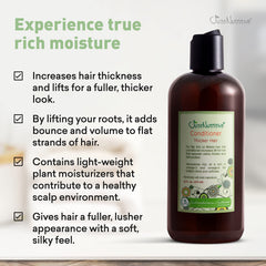 Just Nutritive Thicker Hair Conditioner creamy texture swatch demonstrates smooth application.